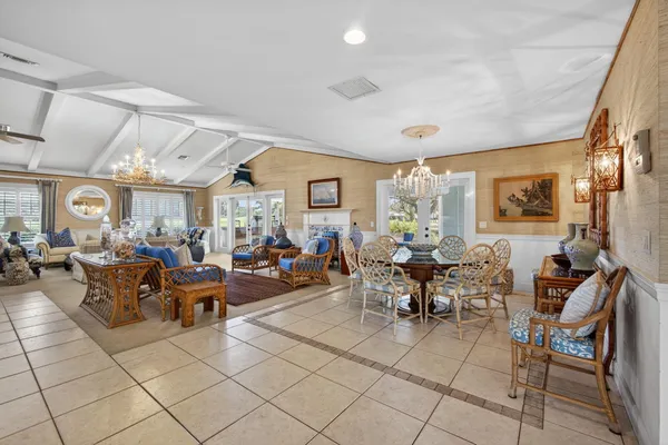 a living room with furniture or couch and a fireplace