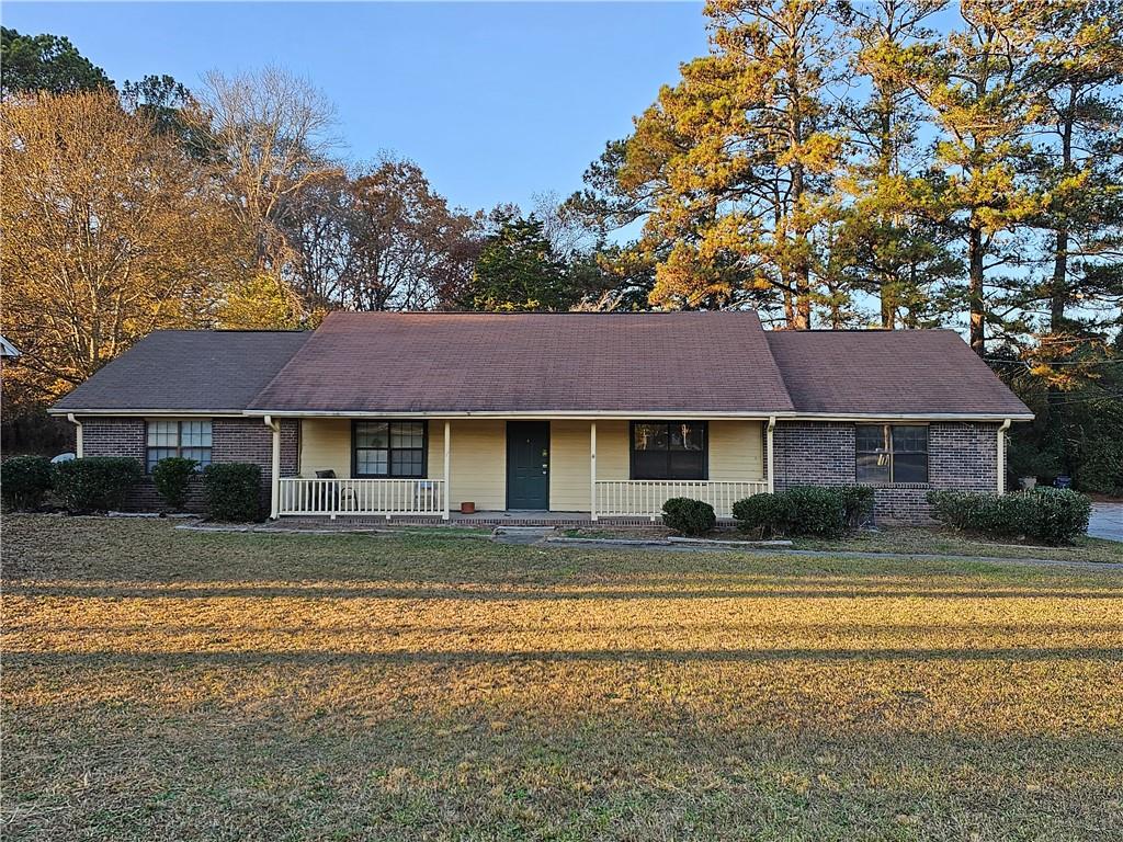 2835 Springdale Road, Unit B Snellville, GA 30039 - Photo 21 of 21 a front view of a house with a yard