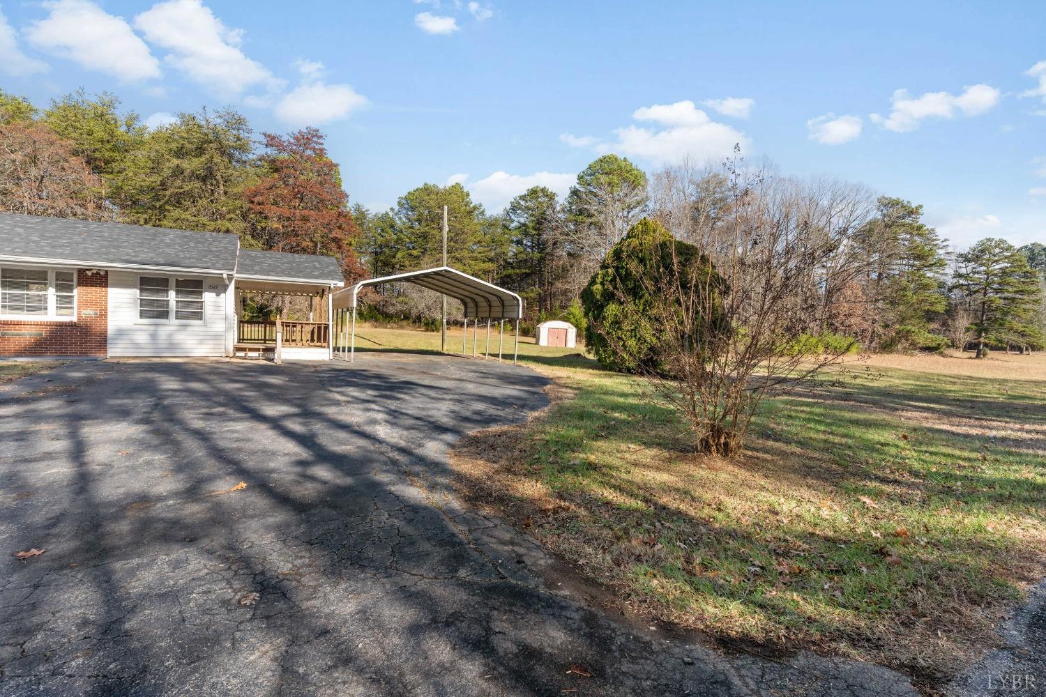 2529 Zion Road Gretna, VA 24557 - Photo 29 of 47 a view of a house with a yard