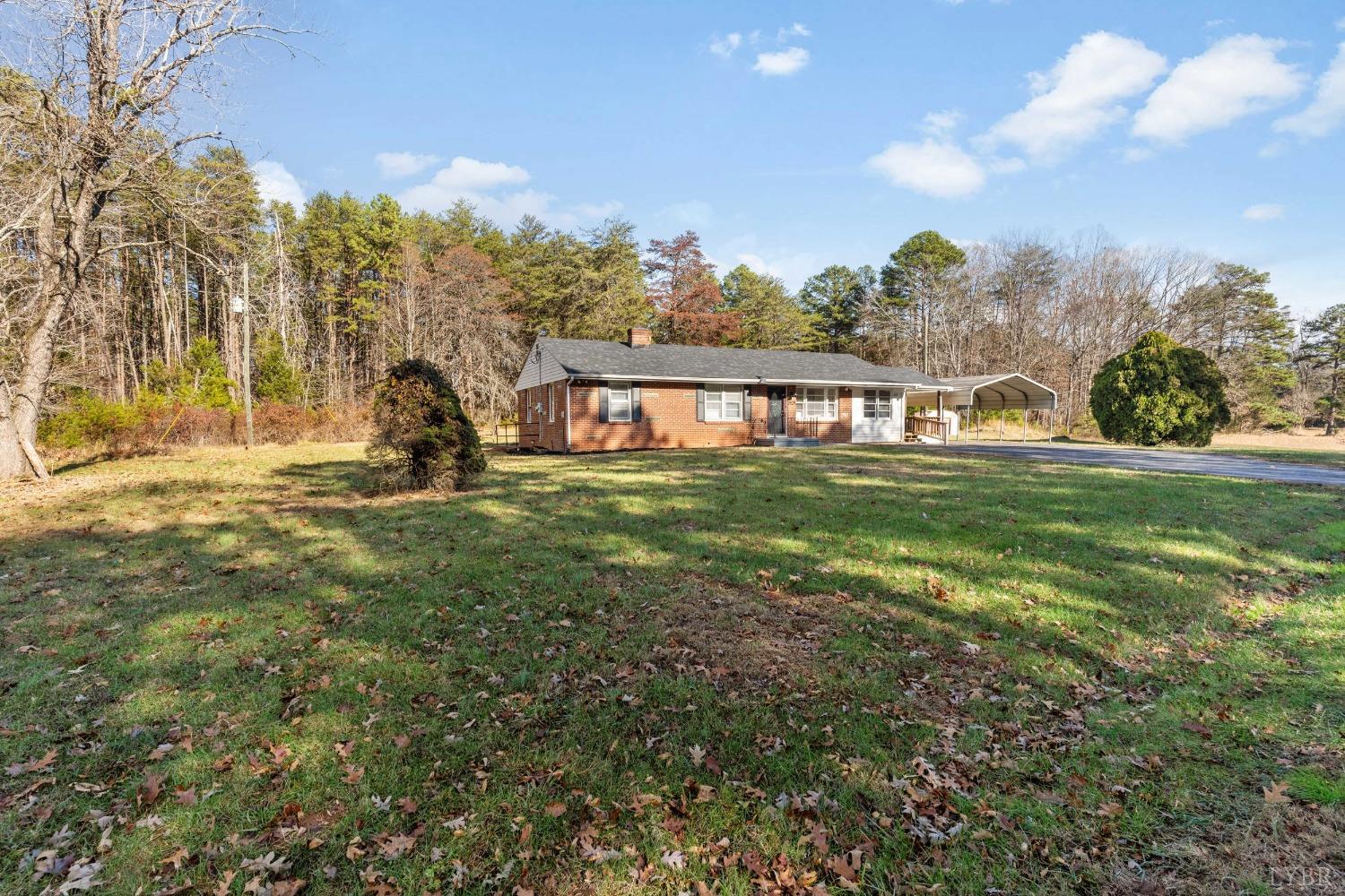 2529 Zion Road Gretna, VA 24557 - Photo 31 of 47 a view of swimming pool with outdoor seating and yard in the back