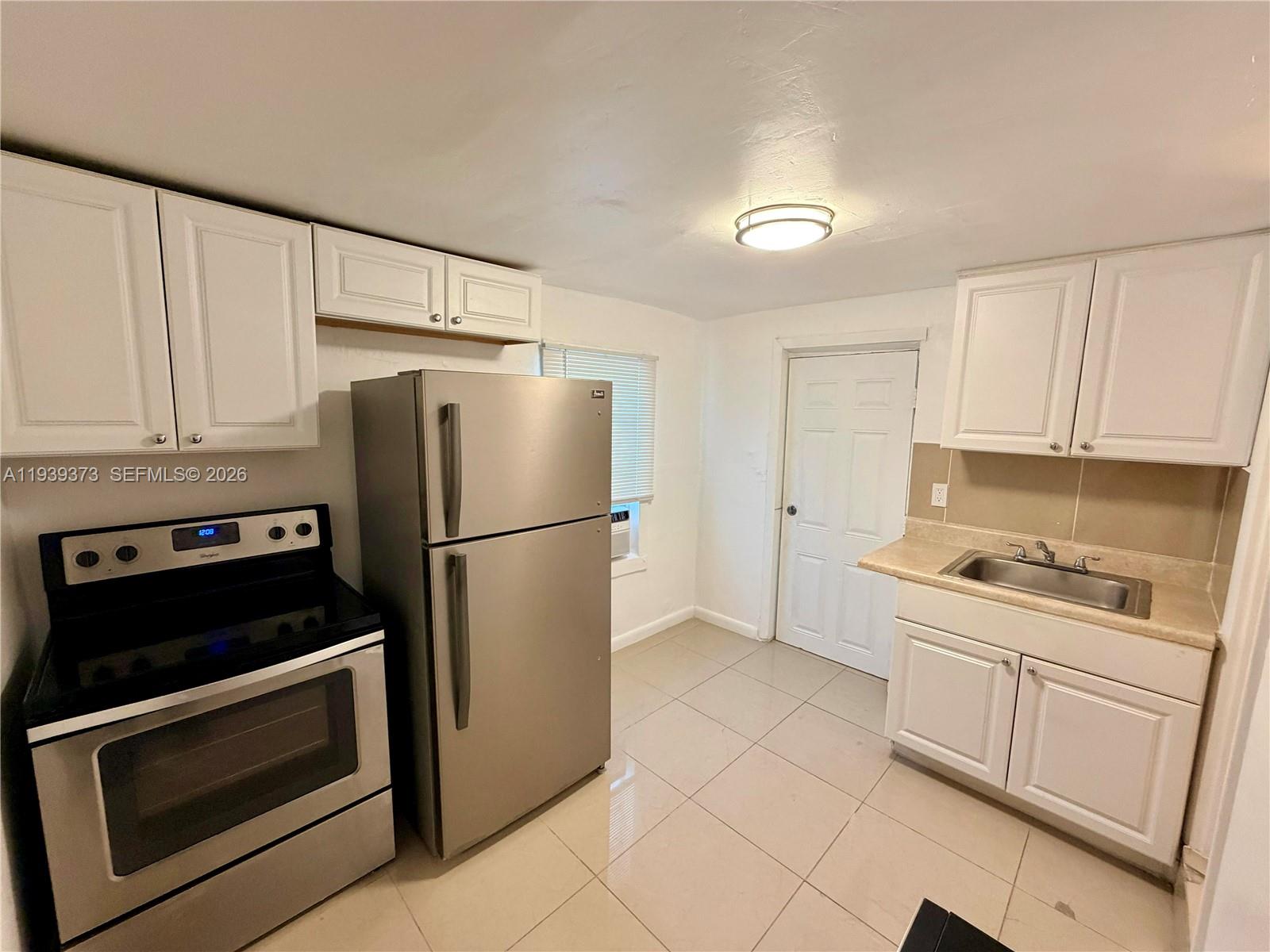 548 Northwest 30th Street, Unit 1 Miami, FL 33127 - Photo 9 of 11