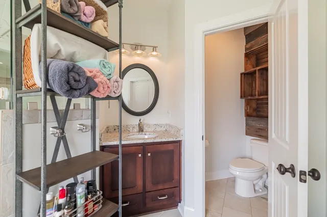 a bathroom with a toilet and a sink