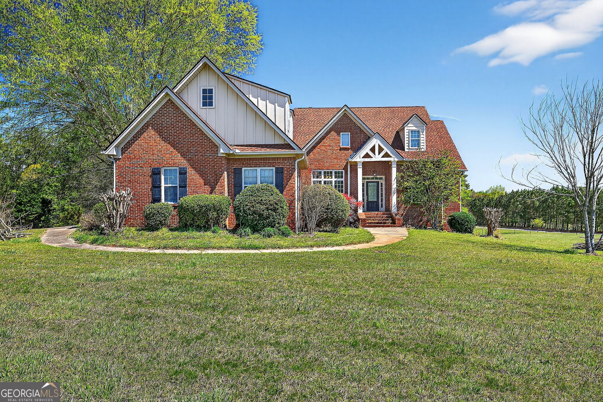 360 Happy Hill Road Carrollton, GA 30116 - Photo 1 of 50 a front view of house with yard and green space
