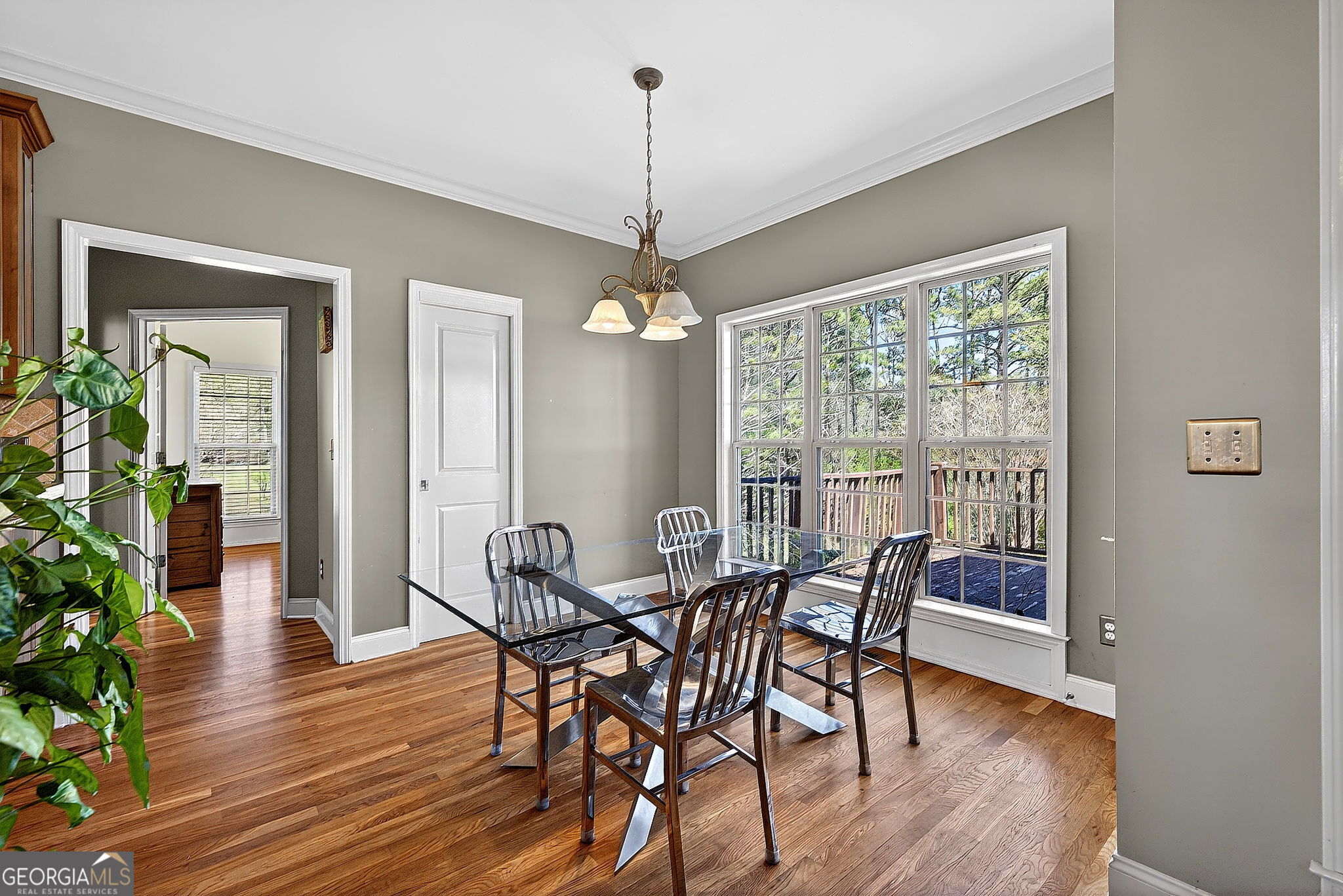 360 Happy Hill Road Carrollton, GA 30116 - Photo 12 of 50 a view of a dining room with furniture window and wooden floor