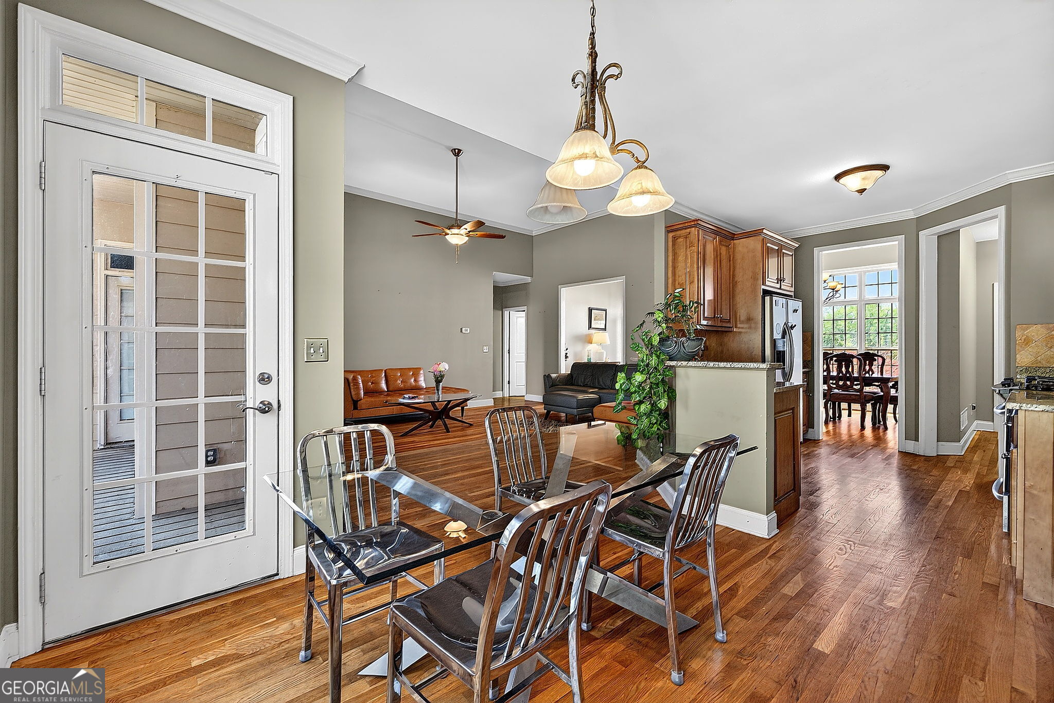 360 Happy Hill Road Carrollton, GA 30116 - Photo 13 of 50 a view of a dining room with furniture window and wooden floor