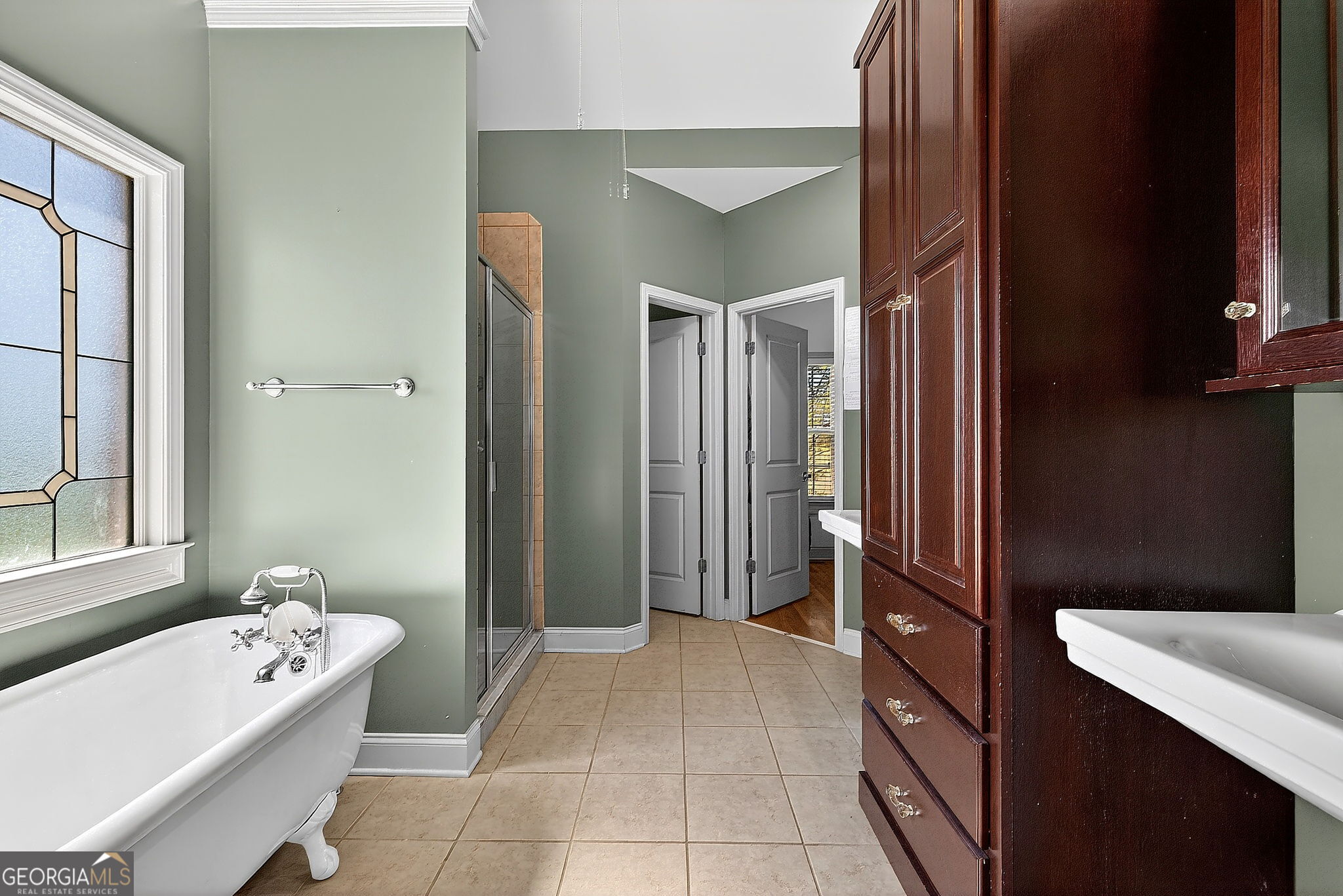 360 Happy Hill Road Carrollton, GA 30116 - Photo 17 of 50 a bathroom with a tub sink and mirror