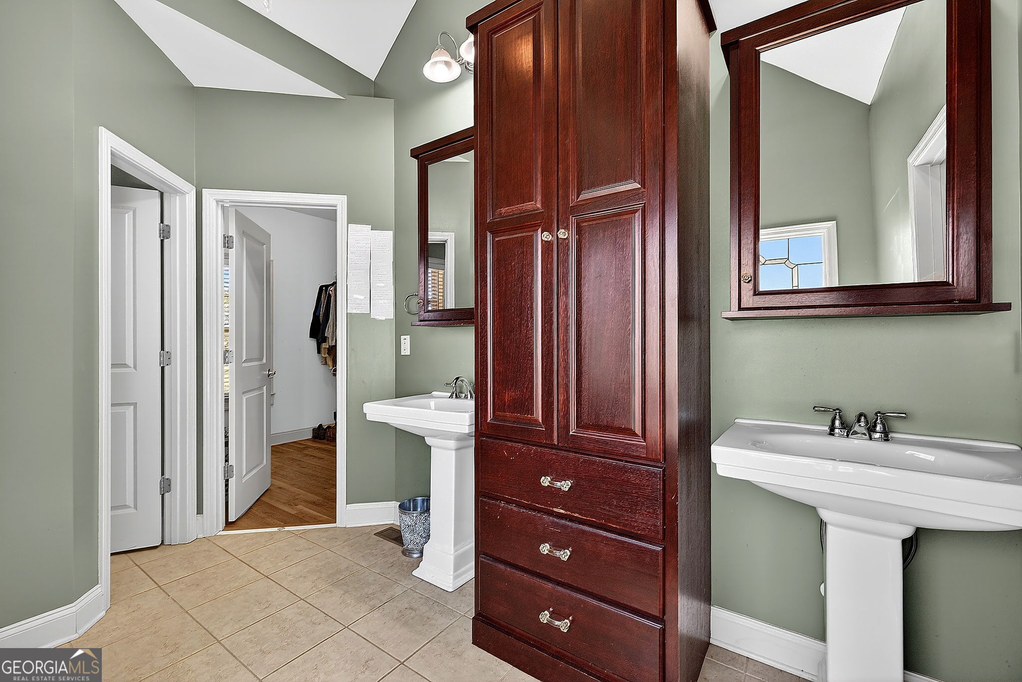 360 Happy Hill Road Carrollton, GA 30116 - Photo 19 of 50 a bathroom with a sink and a mirror
