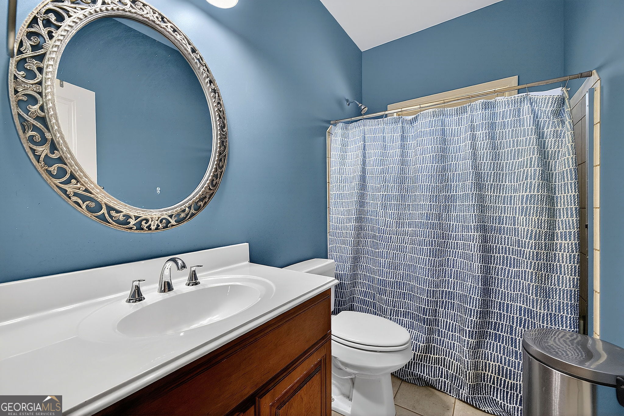 360 Happy Hill Road Carrollton, GA 30116 - Photo 25 of 50 a bathroom with a sink and a mirror