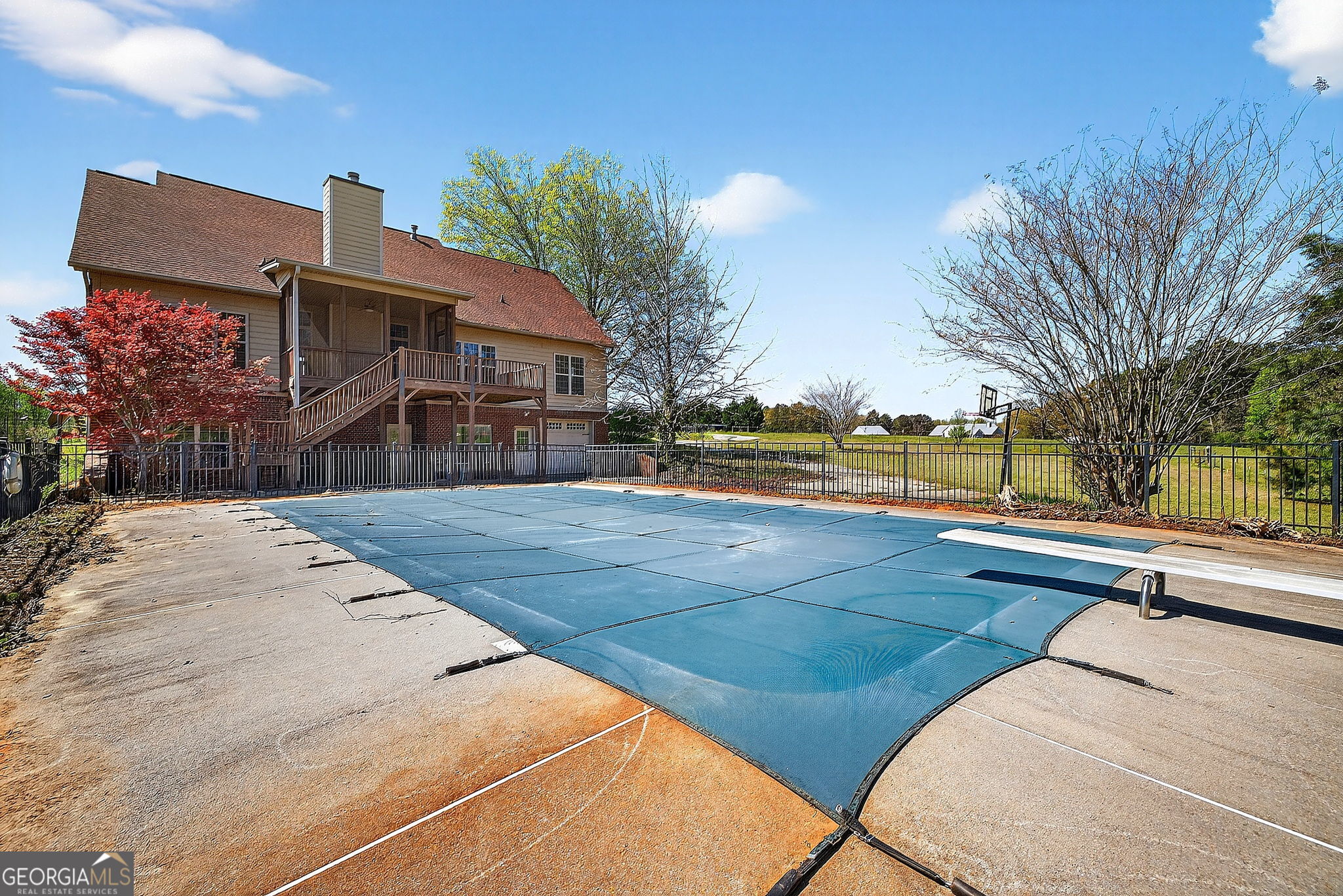 360 Happy Hill Road Carrollton, GA 30116 - Photo 35 of 50 a view of swimming pool with outdoor seating and yard in back