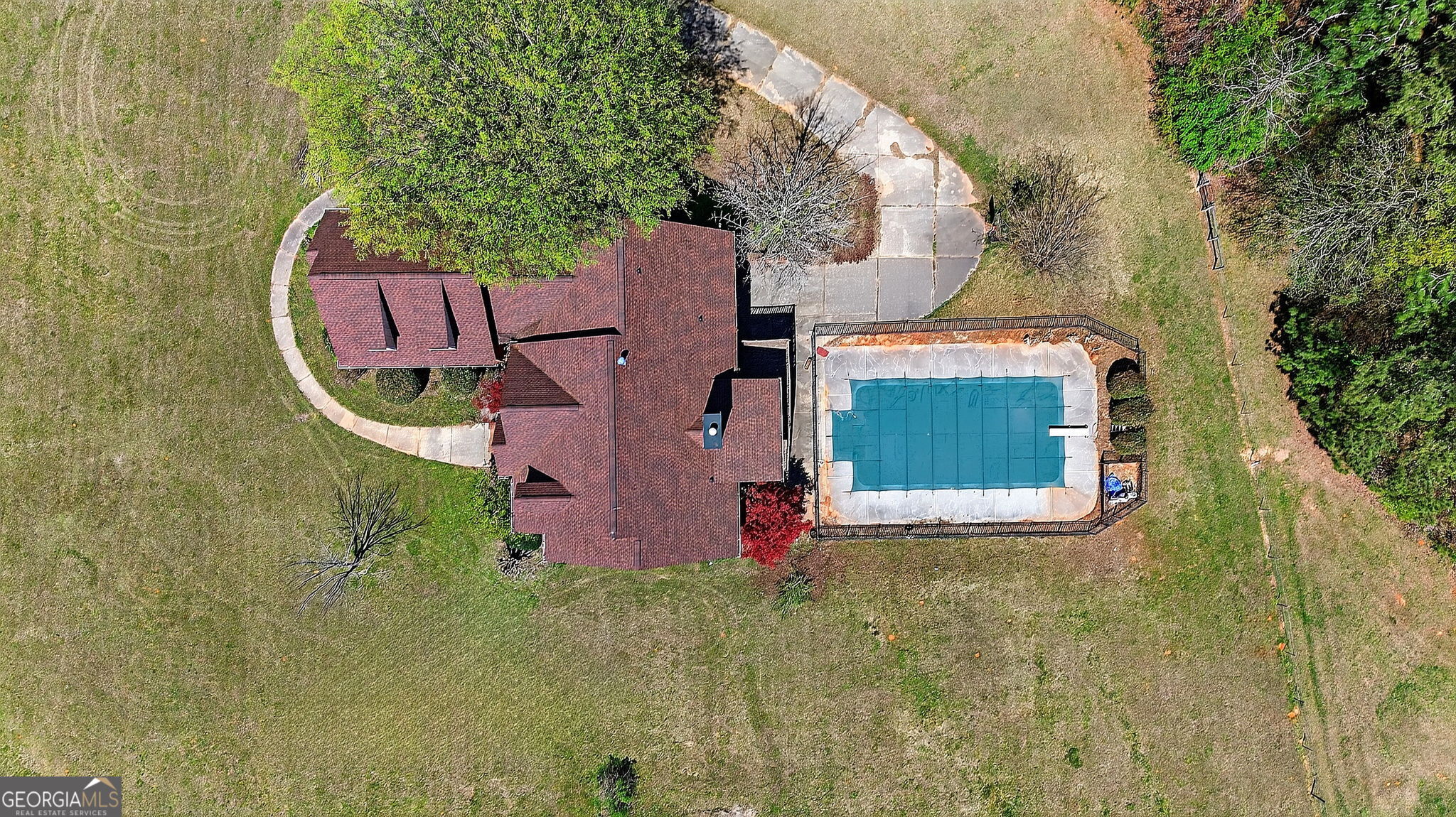 360 Happy Hill Road Carrollton, GA 30116 - Photo 44 of 50 an aerial view of a house with swimming pool and large trees