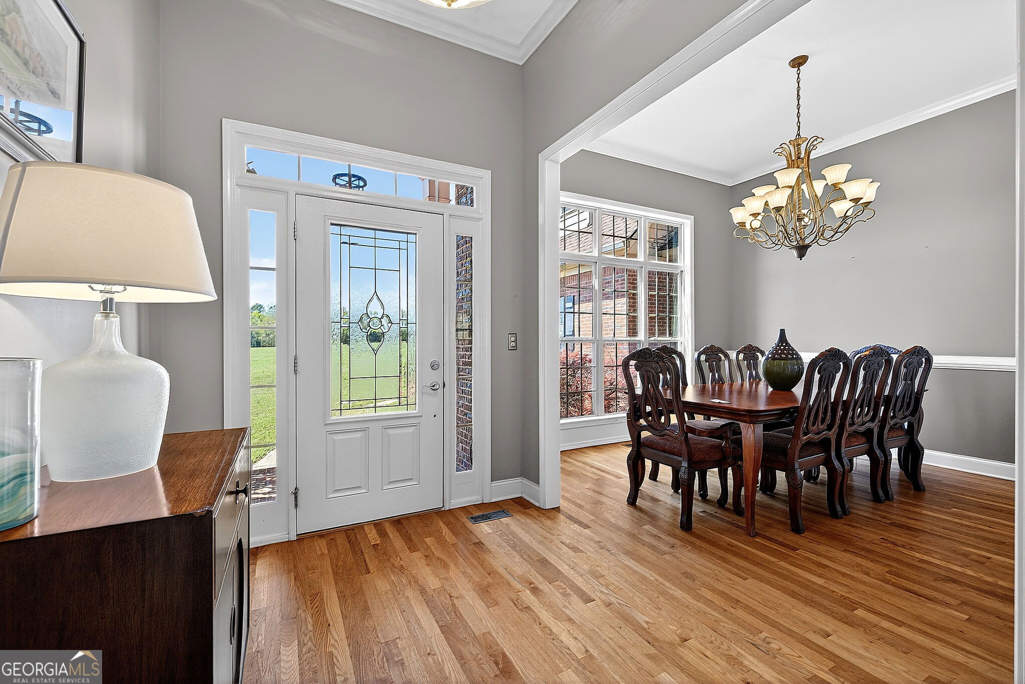 360 Happy Hill Road Carrollton, GA 30116 - Photo 6 of 50 a view of a dining room with furniture window and wooden floor