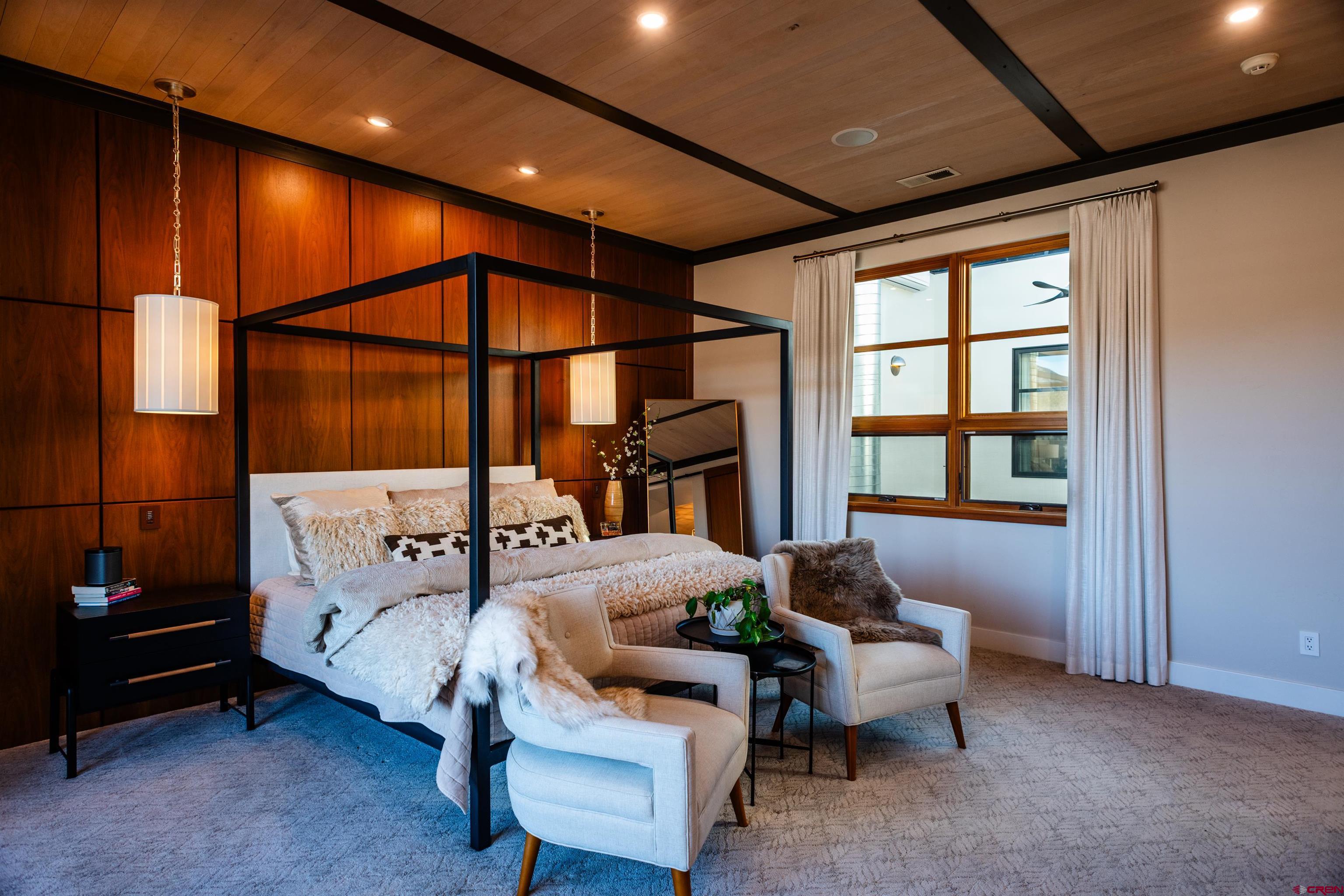 235 Rock Point Drive, Unit 235B Durango, CO 81301 - Photo 23 of 37 a living room with furniture