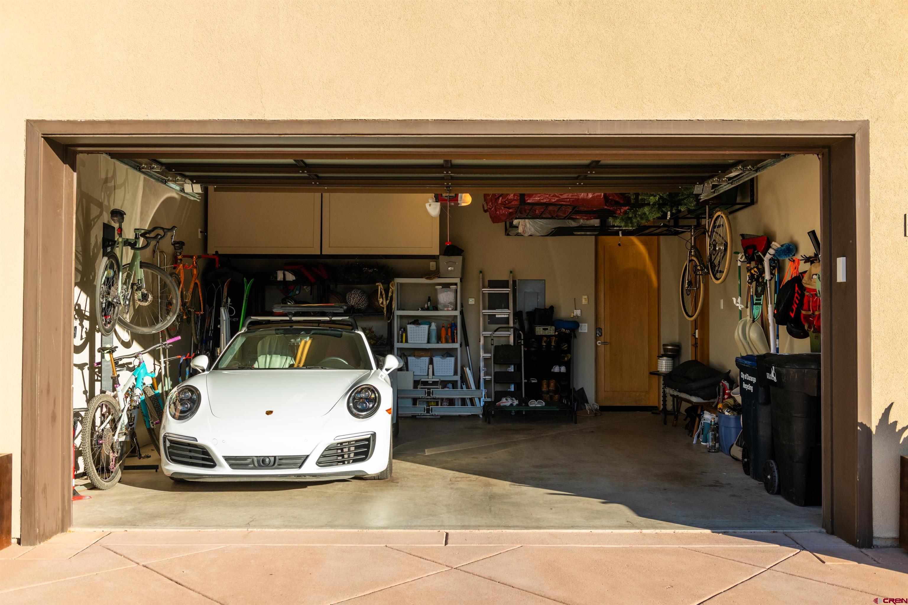 235 Rock Point Drive, Unit 235B Durango, CO 81301 - Photo 34 of 37 a car parked in a garage