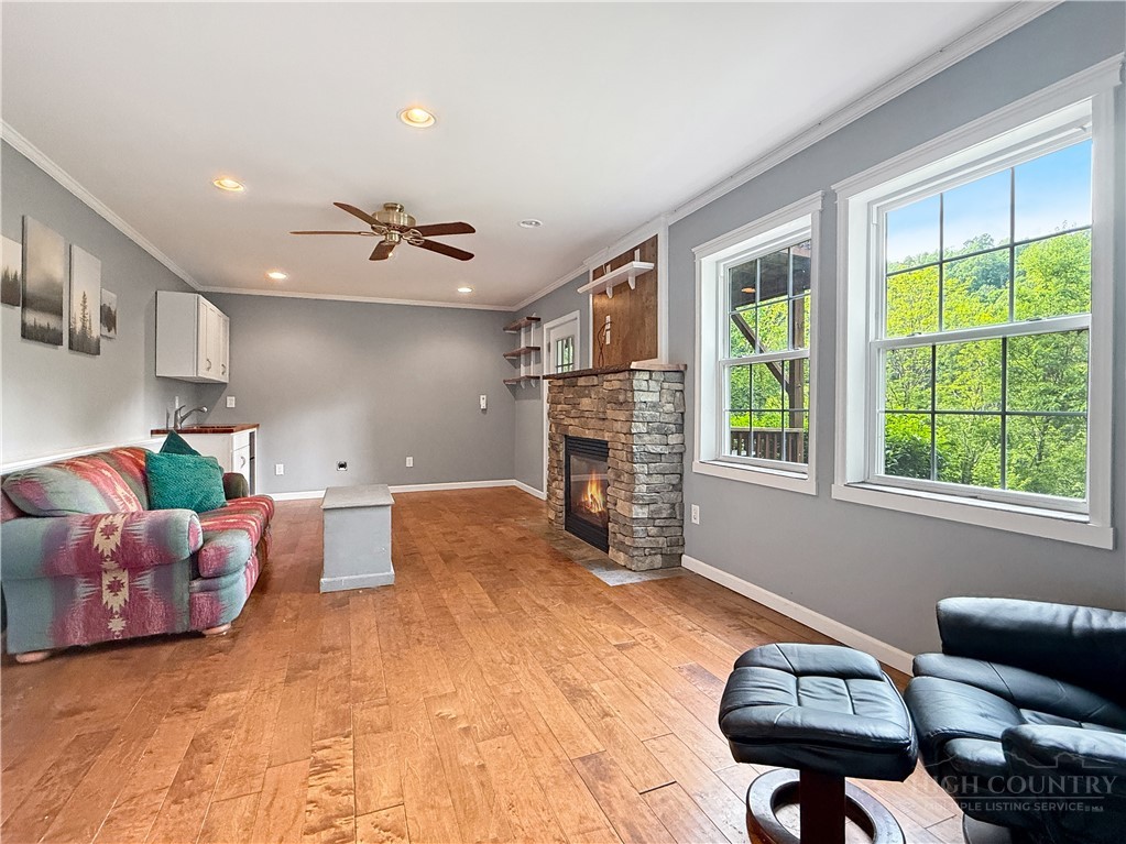 1173 Hopewell Church Road Boone, NC 28607 - Photo 23 of 39 a living room with furniture and a fireplace