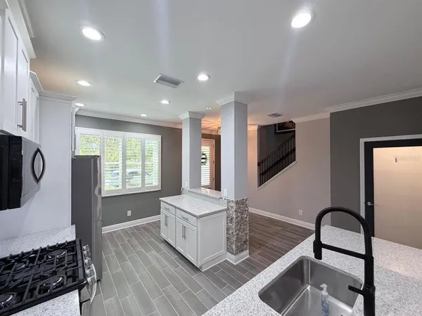 a bed room with a bed and a couch