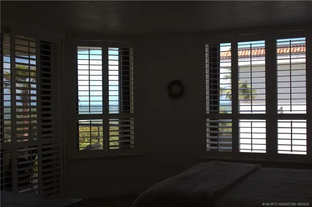 a view of a room that has a window in it