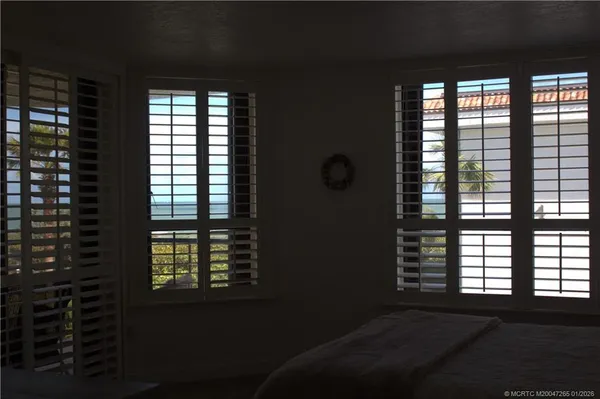 a view of a room that has a window in it