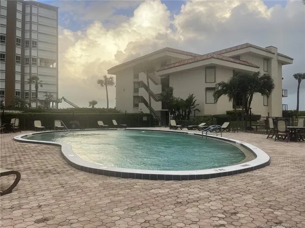 a view of a house with a swimming pool