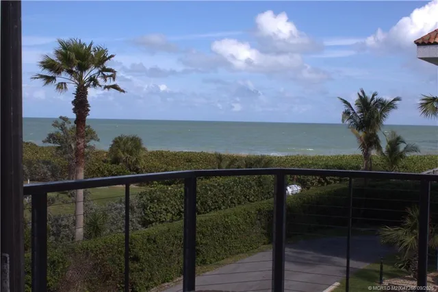 a view of ocean from a balcony