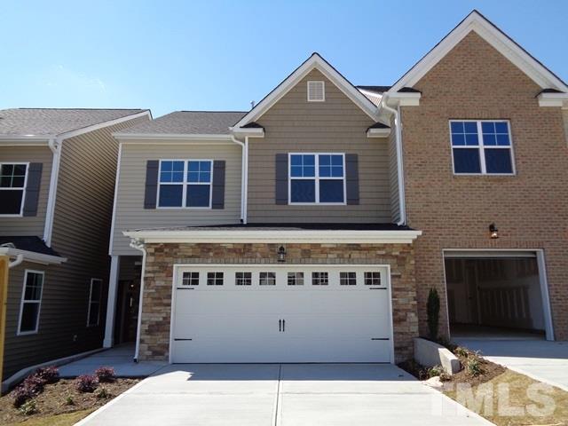111 Torpoint Road Durham, NC 27703 - Photo 1 of 25 a front view of a house with a balcony