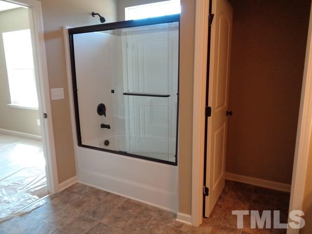 111 Torpoint Road Durham, NC 27703 - Photo 18 of 25 an empty room with window