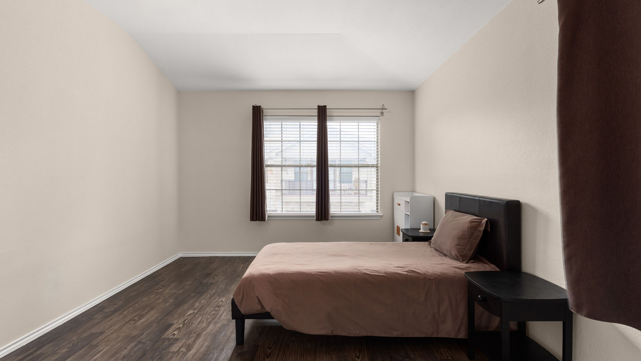 14815 Avery Ranch Boulevard, Unit 1401 Austin, TX 78717 - Photo 13 of 38 Room featuring wood-finish flooring, light-colored walls, and a window with blinds