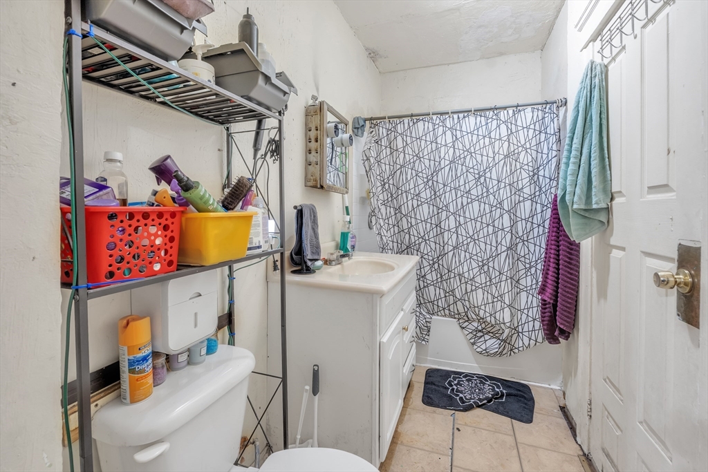 215 Beacon Street Worcester, MA 01610 - Photo 14 of 24 a utility room with dryer and washer