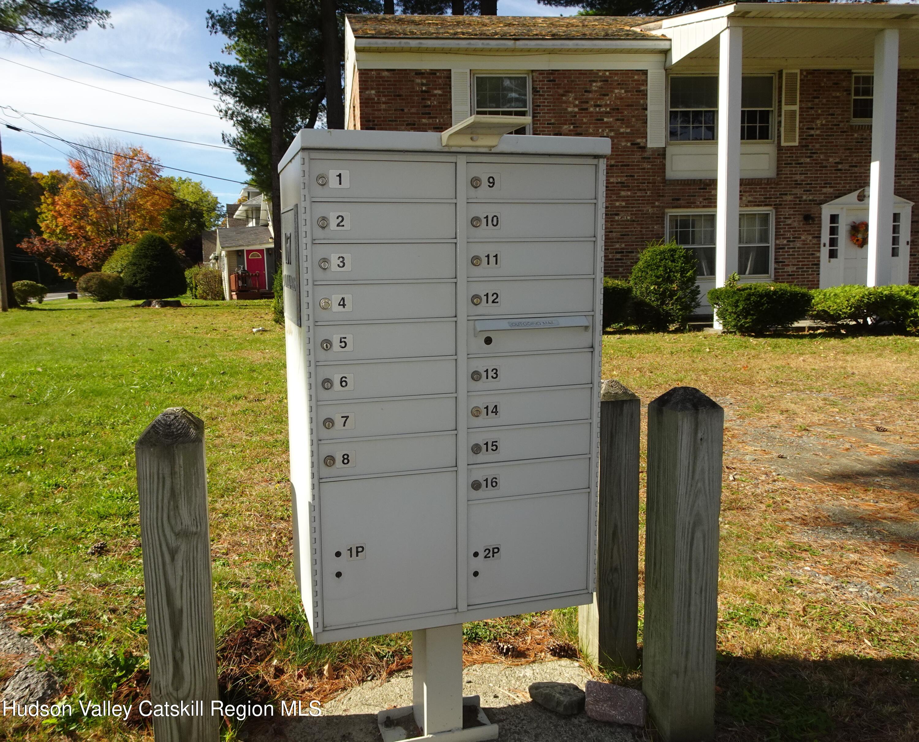 167 Highway 23, Unit 1C Claverack-Red Mills, NY 12513 - Photo 18 of 18 a front view of a house with garden