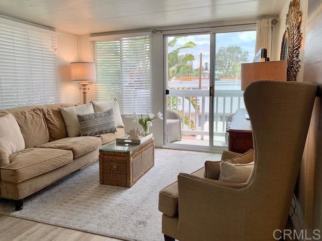 123 Jasper Street, Unit 23 Encinitas, CA 92024 - Photo 17 of 23 a living room with furniture and a large window