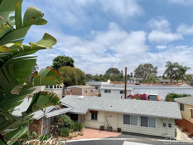 123 Jasper Street, Unit 23 Encinitas, CA 92024 - Photo 20 of 23 a terrace with outdoor seating and outdoor space