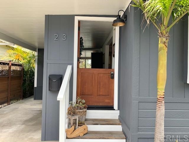 123 Jasper Street, Unit 23 Encinitas, CA 92024 - Photo 5 of 23 a view of a entryway door of the house