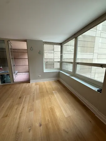 a room with a table and chairs