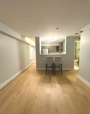 a view of a livingroom with furniture and window