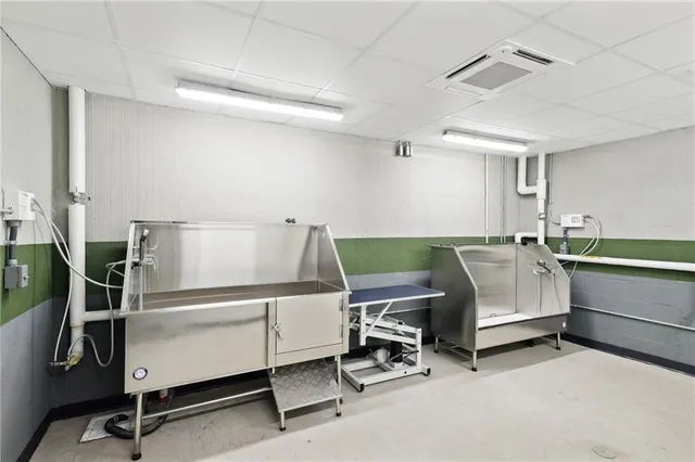 a room with furniture and a large window