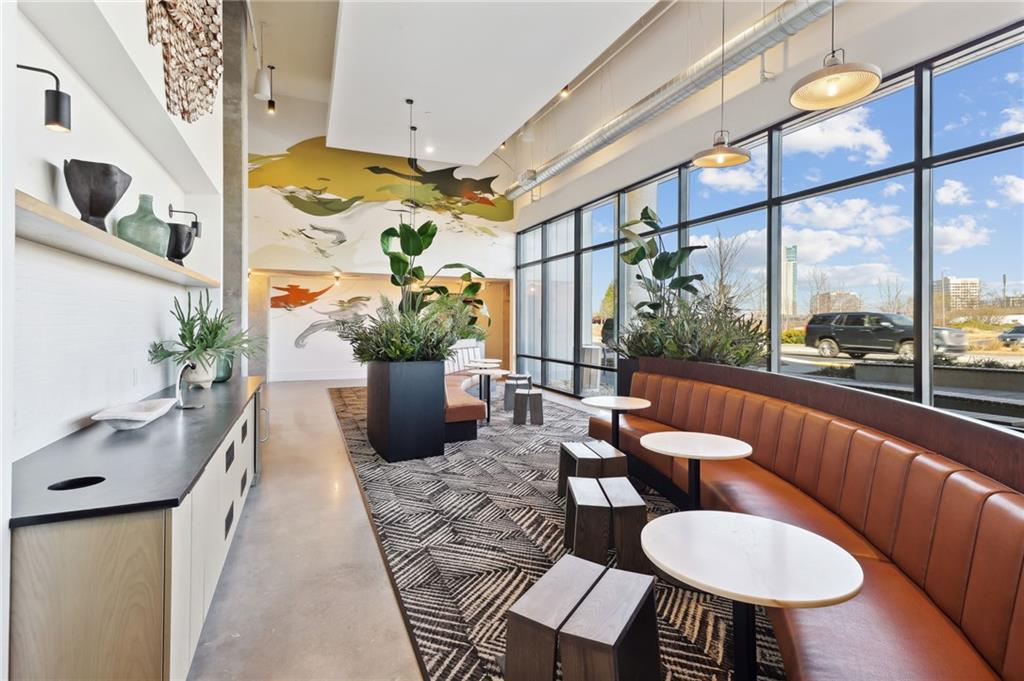 2945 Cumberland Mall, Unit T1032 Atlanta, GA 30339 - Photo 27 of 31 a room with furniture and a large window