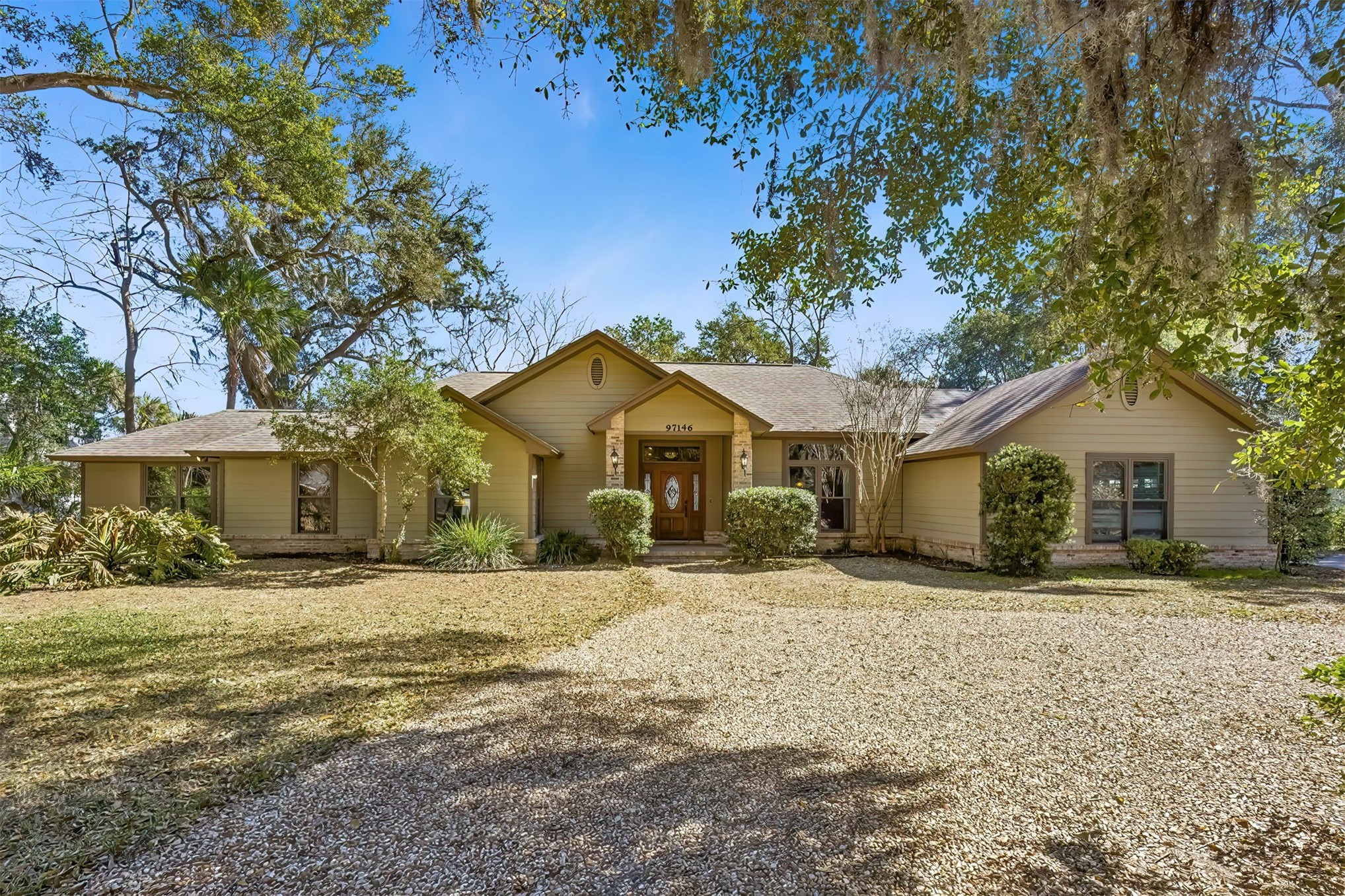 97146 Pirates Point Road Yulee, FL 32097 - Photo 1 of 74 One-acre Waterfront Estate draped in Spanish moss