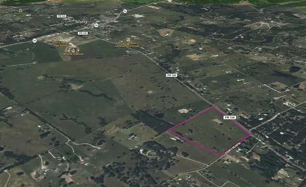 an aerial view of a house with a garden