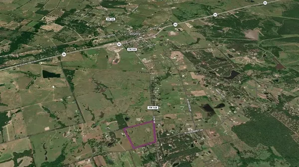 an aerial view of a houses with outdoor space