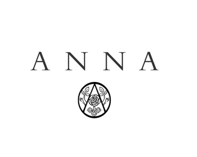 a bathroom with a granite countertop sink and a shower curtain