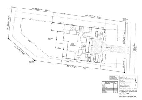 a kitchen with counter top space and sink