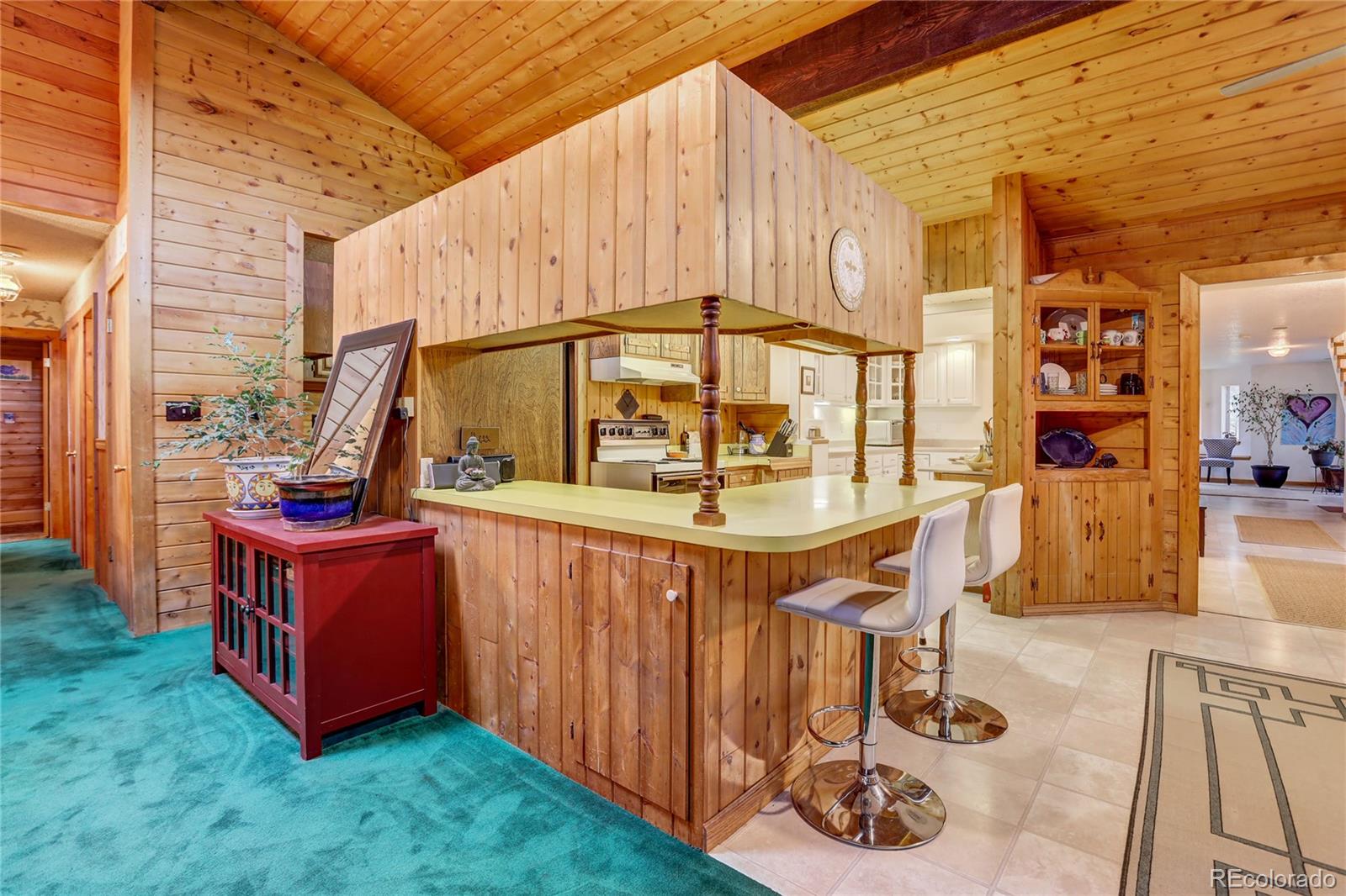 25 Granada Way Pine, CO 80470 - Photo 14 of 40 a view of a backyard with sitting area