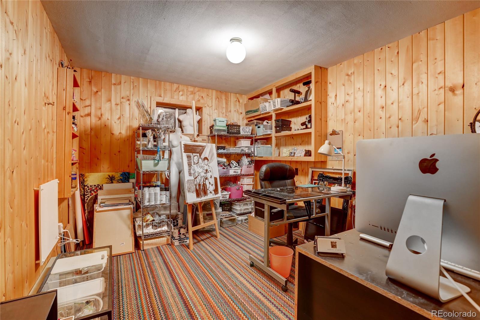 25 Granada Way Pine, CO 80470 - Photo 31 of 40 a view of a workspace with furniture and a window