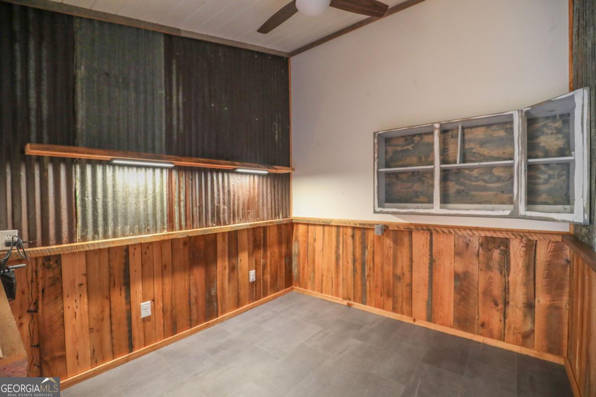 127 Fourth Street Southwest Milledgeville, GA 31061 - Photo 27 of 28 a view of balcony with wooden floor