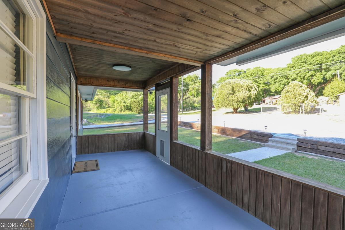 127 Fourth Street Southwest Milledgeville, GA 31061 - Photo 3 of 28 a view of a porch