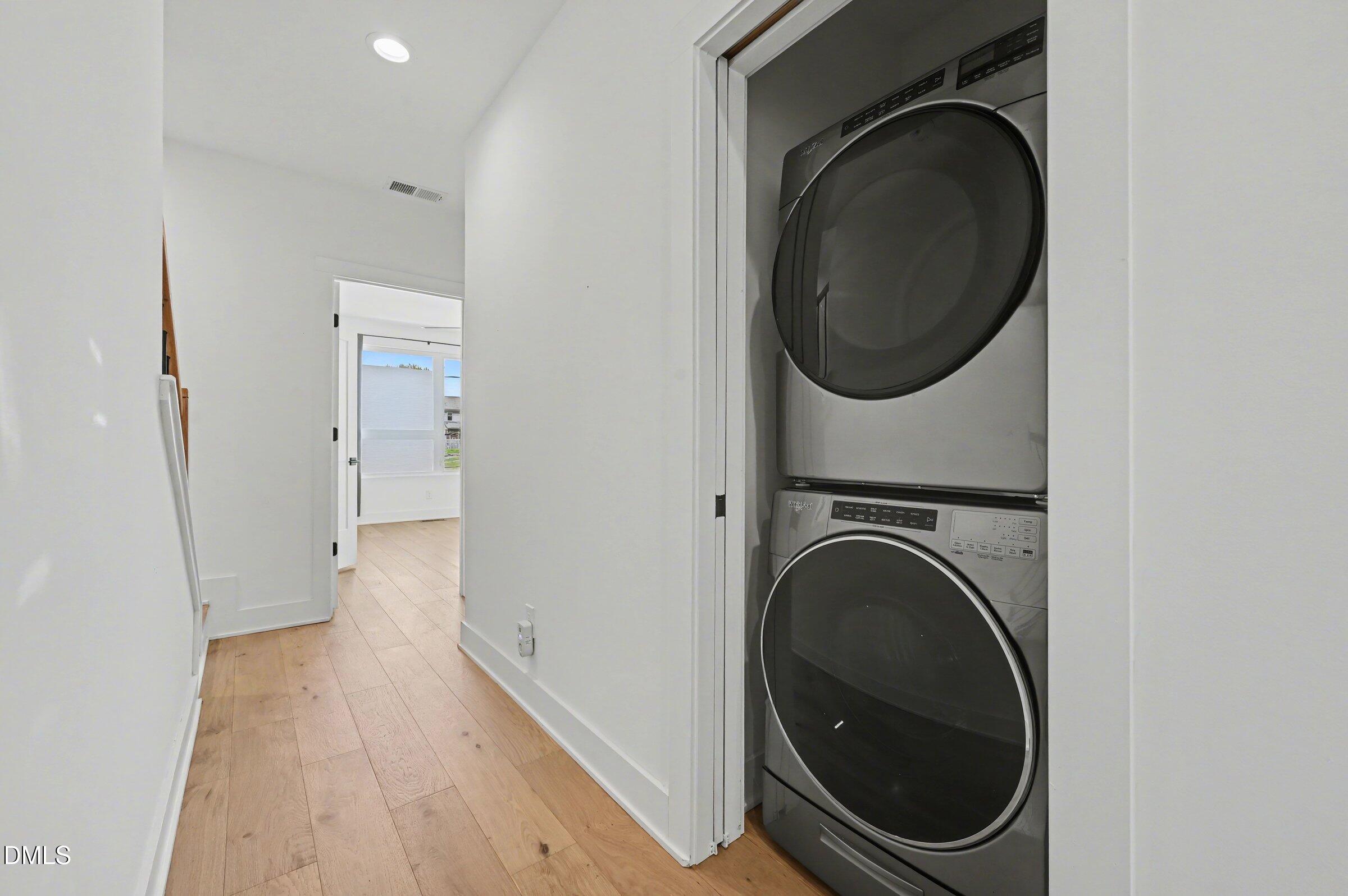 528 North Roxboro Street Durham, NC 27701 - Photo 15 of 26 a view of a hallway with washer and dryer