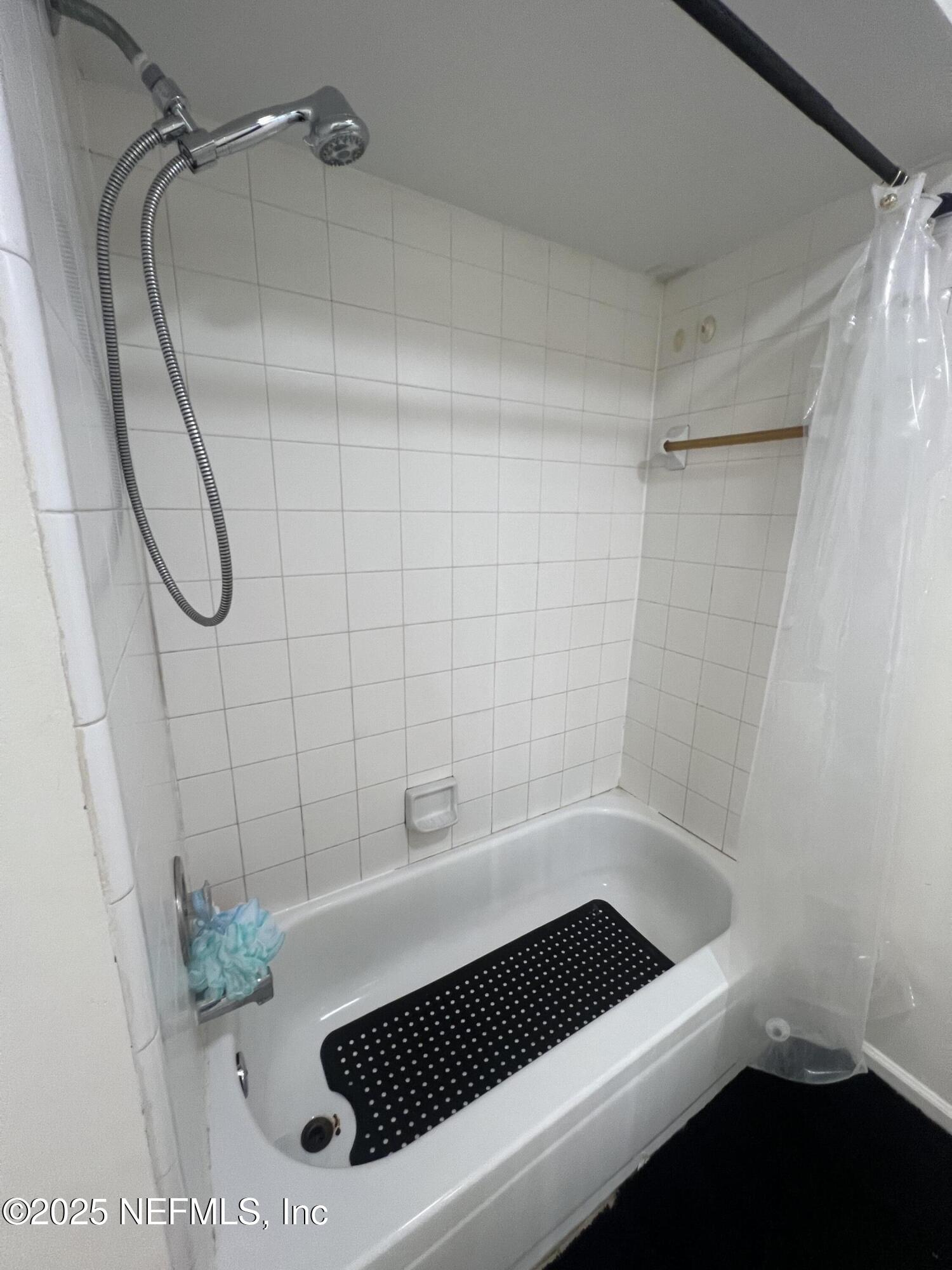 957 Aries Road West Jacksonville, FL 32216 - Photo 18 of 28 a bathroom with a shower