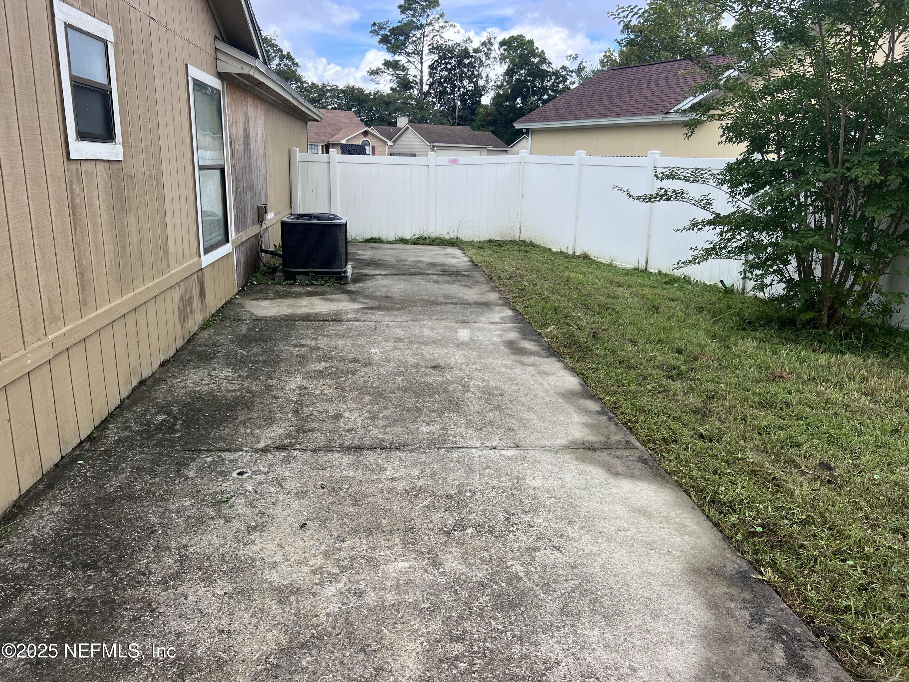 957 Aries Road West Jacksonville, FL 32216 - Photo 10 of 28 a view of a house with a yard