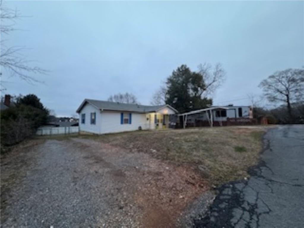 209 Moultrie Lane Southwest Rome, GA 30161 - Photo 5 of 46 a view of a house with a yard