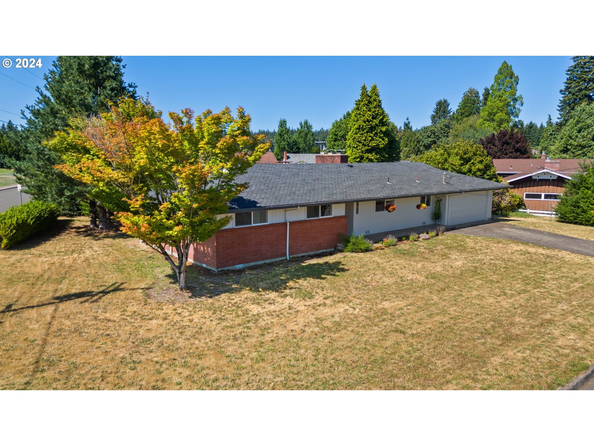 a black and white photo of a house