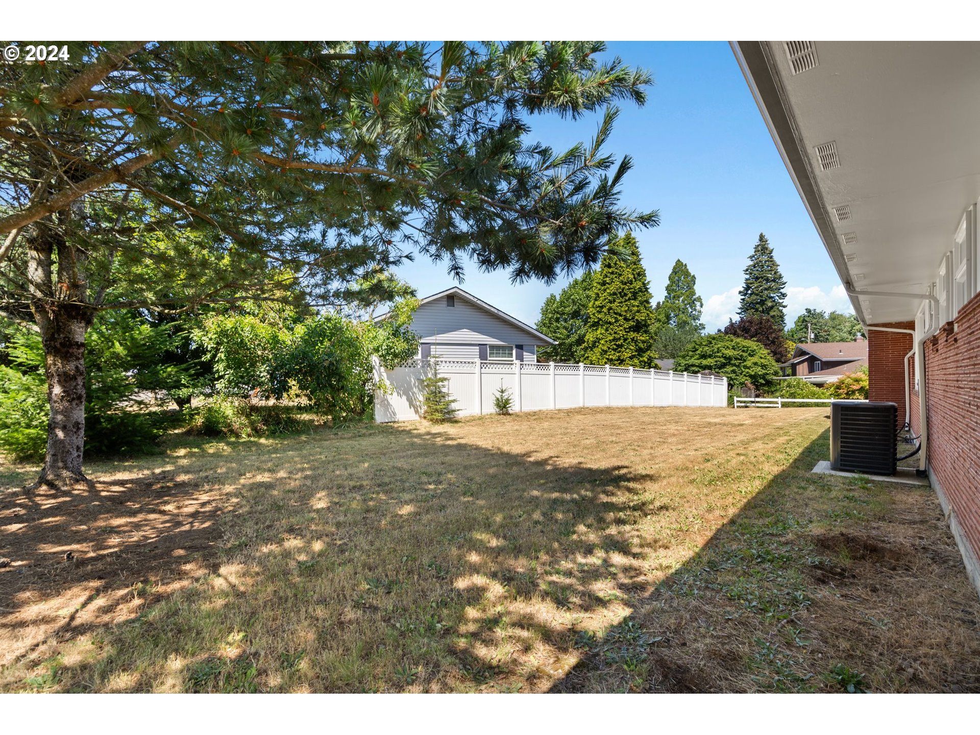 1617 Northeast Ione Loop Camas, WA 98607 - Photo 13 of 15 a view of house with backyard and tree